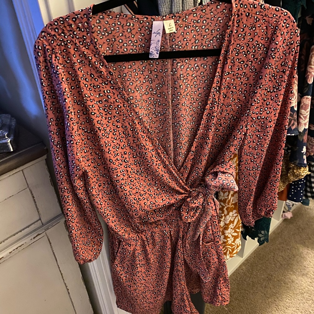 Pink cheetah print romper